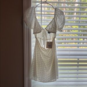 Kittenish white linen dress